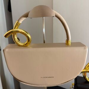 Chic Beige Clutch with Gold Accents